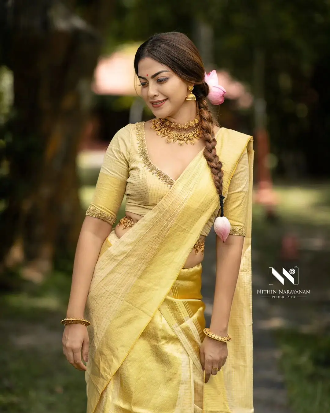 Anusree Nair Wearing Beautiful Earrings Jewellery Yellow Saree Blouse